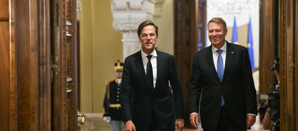 Klaus Iohannis și Mark Rutte Klaus Iohannis și Mark Rutte - Sputnik Moldova-România