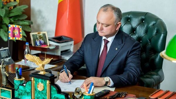 Igor Dodon a promulgat pachetul de legi pentru care Guvernul și-a asumat răspunderea - Sputnik Moldova