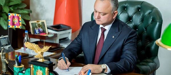 Igor Dodon a promulgat pachetul de legi pentru care Guvernul și-a asumat răspunderea - Sputnik Moldova
