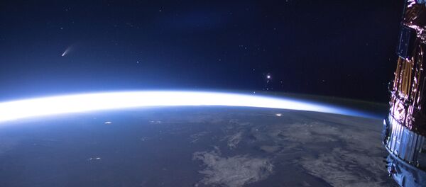 Комета NEOWISE над Землей Комета NEOWISE над Землей - Sputnik Moldova