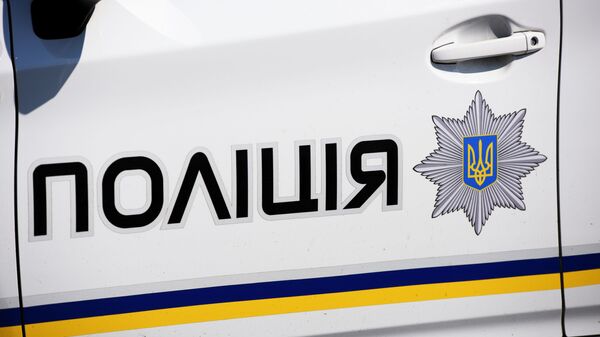 Автомобиль сотрудников Украинской полиции в Киеве - Sputnik Молдова
