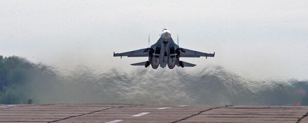 Истребитель СУ-27 во время учебно-тренировочного полета (11 мая 2012). Калининградская область - Sputnik Молдова
