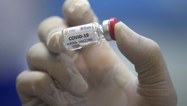 Вакцина от COVID-19 во время тестирования в исследовательском центре вакцин - Sputnik Moldova