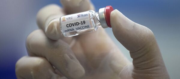 Вакцина от COVID-19 во время тестирования в исследовательском центре вакцин - Sputnik Moldova