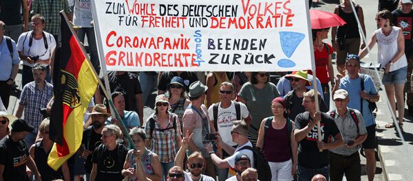 Демонстрация против правительственных ограничений на фоне вспышки коронавирусной болезни (COVID-19) в Берлине - Sputnik Moldova-România
