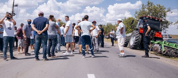 Протесты аграриев в Кэушень Протесты аграриев в Кэушень - Sputnik Молдова