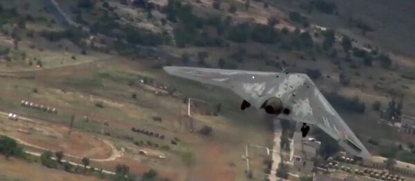 Испытания боевого беспилотного авиационного комплекса Охотник - Sputnik Молдова