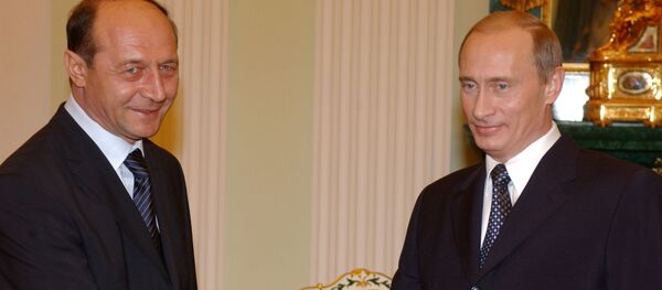 Vladimir putin și Traian Băsescu - Sputnik Moldova-România