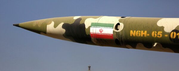 A missile is displayed at an exhibition on the 1980-88 Iran-Iraq war, at a park, northern Tehran, Iran, Thursday, Sept. 25, 2014 - Sputnik Moldova