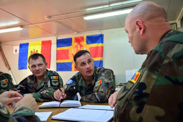 În exclusivitate pentru Sputnik: Militarii moldoveni în Kosovo despre riscurile misiunii În exclusivitate pentru Sputnik: Militarii moldoveni în Kosovo despre riscurile misiunii - Sputnik Moldova