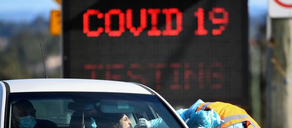 Un test de Covid-19 effectué sur une route à Sydney, Australie - Sputnik Moldova