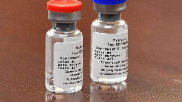 Первая в мире зарегистрированная вакцина от коронавируса COVID-19 Спутник V - Sputnik Moldova-România
