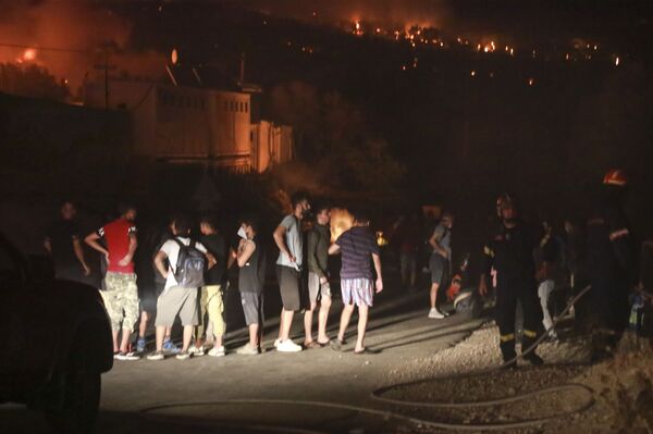 Пожар в лагере мигрантов Мория на острове Лесбос - Sputnik Moldova-România