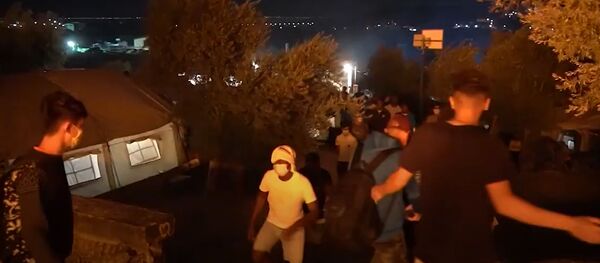 В Греции на острове Лесбос сгорел крупнейший лагерь мигрантов В Греции на острове Лесбос сгорел крупнейший лагерь мигрантов - Sputnik Молдова