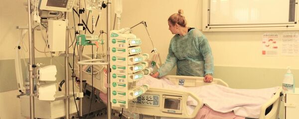 Secția terapie intensivă a unui spital din București - Sputnik Молдова