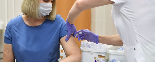 Вакцинация добровольцев против COVID-19 в Москве Вакцинация добровольцев против COVID-19 в Москве - Sputnik Moldova-România