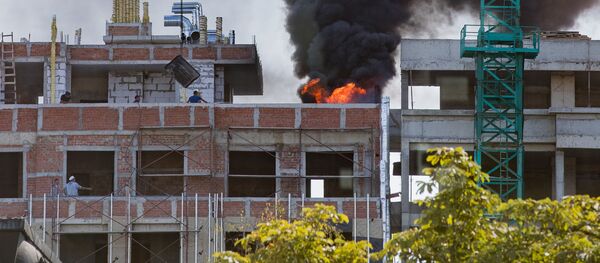 Incendiu la un bloc în construcție în centrul Chișinăului Incendiu la un bloc în construcție în centrul Chișinăului - Sputnik Молдова