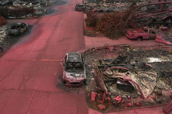 Сгоревшие здания и машины, покрытые огнестойким материалом в штате Орегон  - Sputnik Молдова