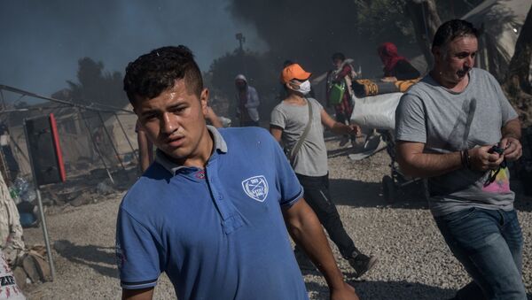 Последствия пожара в лагере мигрантов в Греции - Sputnik Moldova-România