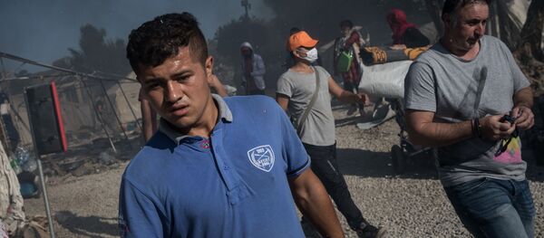 Последствия пожара в лагере мигрантов в Греции - Sputnik Moldova-România