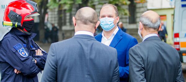 Ион Чебан на месте пожара в здании Филармонии - Sputnik Moldova