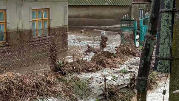 Ploile au făcut prăpăd în mai multe localități - Sputnik Молдова