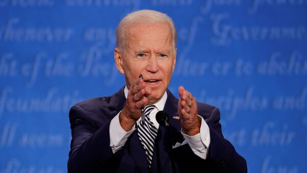 Democratic presidential nominee Joe Biden participates in the first 2020 presidential campaign debate with U.S. President Donald Trump, held on the campus of the Cleveland Clinic at Case Western Reserve University in Cleveland, Ohio, U.S., September 29, 2020. - Sputnik Moldova-România