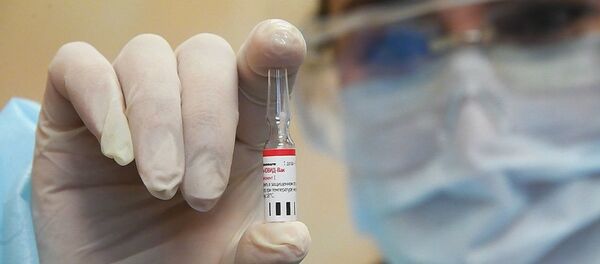 Первые добровольцы получили прививку от коронавируса Первые добровольцы получили прививку от коронавируса - Sputnik Молдова