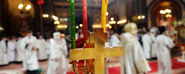 Cruce și lumânări în 3 culori de Paști - Sputnik Moldova