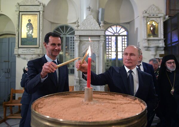 Президент России Владимир Путин и президент Сирии Башар Асад в кафедральном соборе Пресвятой Богородицы в Дамаске - Sputnik Moldova