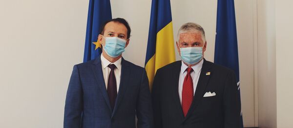 Adrian Zuckerman și Florin Cîțu Adrian Zuckerman și Florin Cîțu - Sputnik Moldova-România