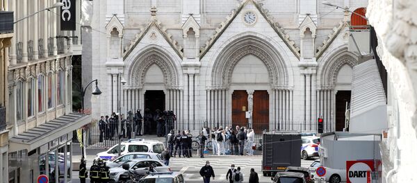 Security forces guard the area after a reported knife attack at Notre Dame church in Nice, France - Sputnik Moldova-România