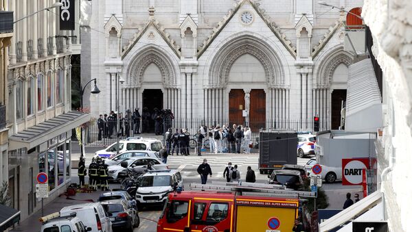 Security forces guard the area after a reported knife attack at Notre Dame church in Nice, France - Sputnik Moldova-România