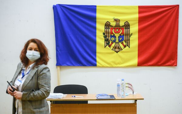 Membru al Comisiei Electorale Centrale la alegerile prezidențiale din Moldova în clădirea Institutului de Arhitectură din Moscova (Academia de Stat).
 - Sputnik Moldova