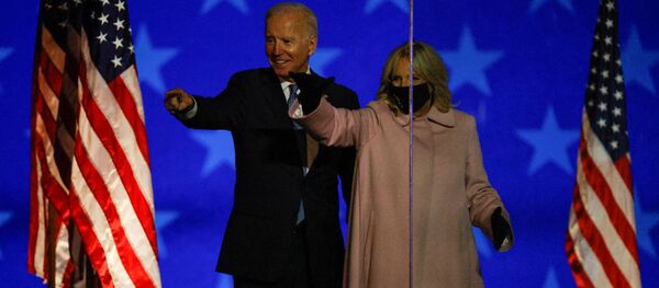 Джо Байден с супругой выступают в Уилмингтоне, штат Делавэр, США Джо Байден с супругой выступают в Уилмингтоне, штат Делавэр, США - Sputnik Moldova-România