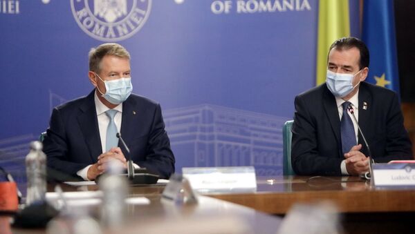 Klaus Iohannis și Ludovic Orban - Sputnik Moldova-România