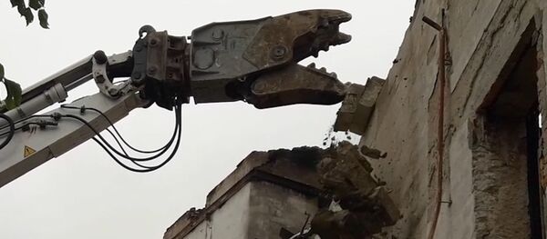 Начались работы по частичному сносу здания филармонии  - Sputnik Молдова