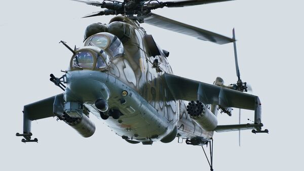 Вертолет Ми-24 на совместном военном антитеррористическом учении вооруженных сил государств – членов ШОС Мирная миссия – 2018 над полигоном в Чебаркуле - Sputnik Moldova
