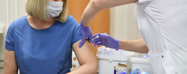 Вакцинация добровольцев против COVID-19 в Москве - Sputnik Moldova