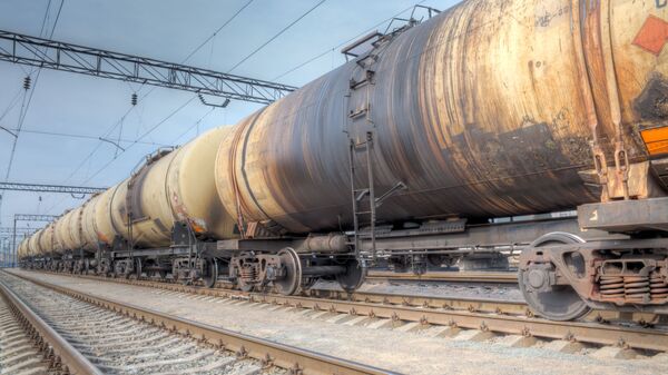 Товарный поезд на железнодорожной станции - Sputnik Молдова