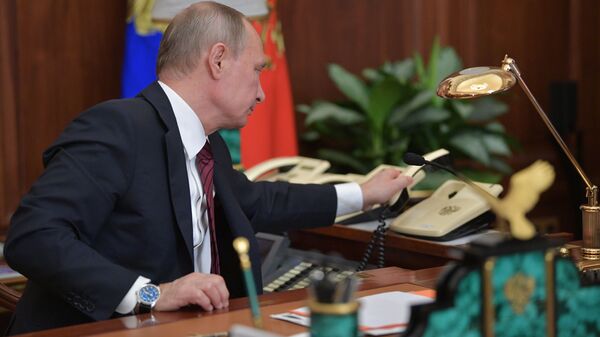 Президент РФ В. Путин провел телефонный разговор с главами ДНР А. Захарченко и ЛНР И. Плотницким - Sputnik Moldova