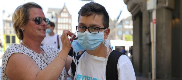 Restricții COVID în Olanda, masca obligatorie Restricții COVID în Olanda, masca obligatorie - Sputnik Moldova
