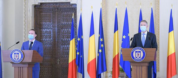 Klaus Iohannis și Florin Cîțu - Sputnik Moldova-România