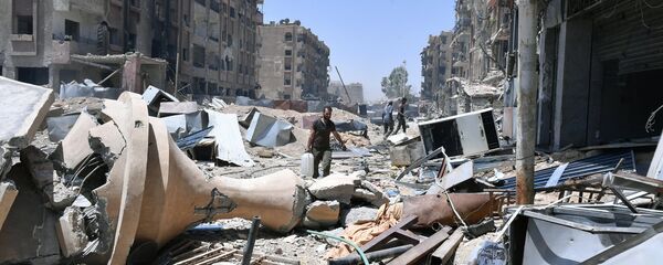 Сирийская армия освободила лагерь палестинских беженцев Ярмук на юге Дамаска  - Sputnik Moldova-România