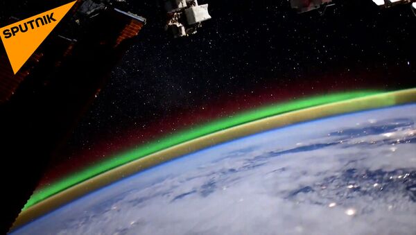 Aurora boreală, filmată din spațiu de un cosmonaut rus  - Sputnik Moldova
