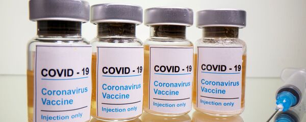 Иллюстрационное фото вакцины от Covid19 с логотипом Moderna - Sputnik Moldova-România