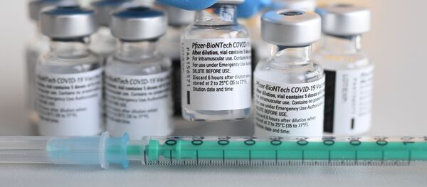 Дозы вакцины Pfizer-BioNTech Дозы вакцины Pfizer-BioNTech - Sputnik Молдова