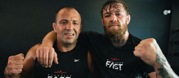 Сергей Пикульский и Конор Макгрегор Сергей Пикульский и Конор Макгрегор - Sputnik Молдова