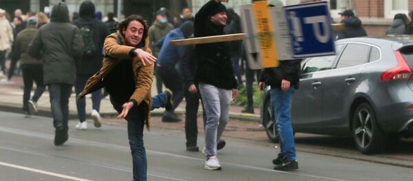 Протесты против COVID-мер в Нидерландах Протесты против COVID-мер в Нидерландах - Sputnik Молдова