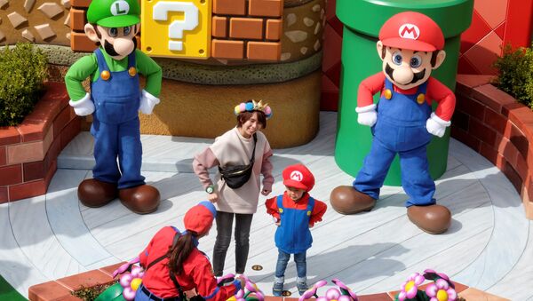 Персонажи игры Супер Марио  в парке аттракционов Super Nintendo World в Осаке - Sputnik Молдова